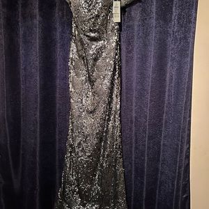 Rene Ruiz Gown Never worn tags still on size 8 Color Pewter sequins!